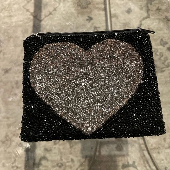 Moyna Black small pouch with silver heart. Top Zip . 5”w X 4 1/2w. - Picture 9 of 11